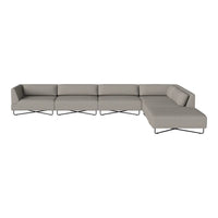 Gray sectional sofa with modern lines and minimalistic design on a sleek metal frame. Perfect for contemporary decor.