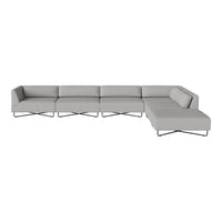Modern gray sectional sofa with sleek lines and minimalistic design, featuring a subtle pattern and metal accents.