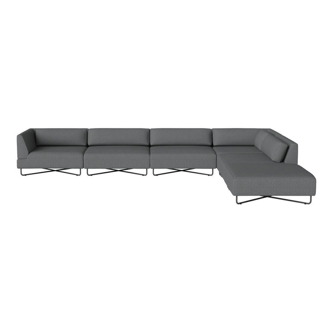 Modern sectional sofa in solid gray with clean lines and minimalist design, featuring sleek metal accents.