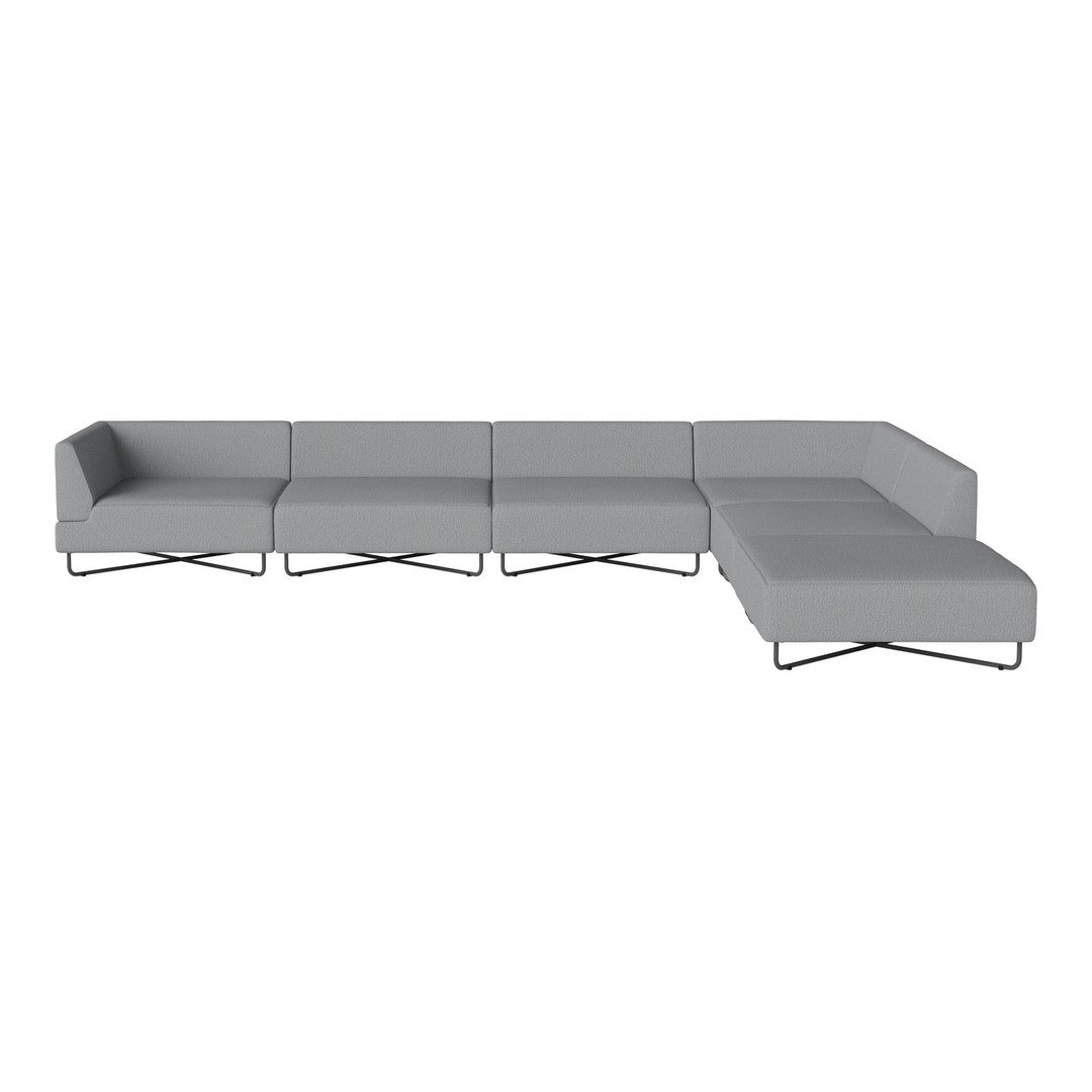 Gray sectional sofa with a modern design, featuring smooth fabric and sleek metal legs. Ideal for contemporary living spaces.