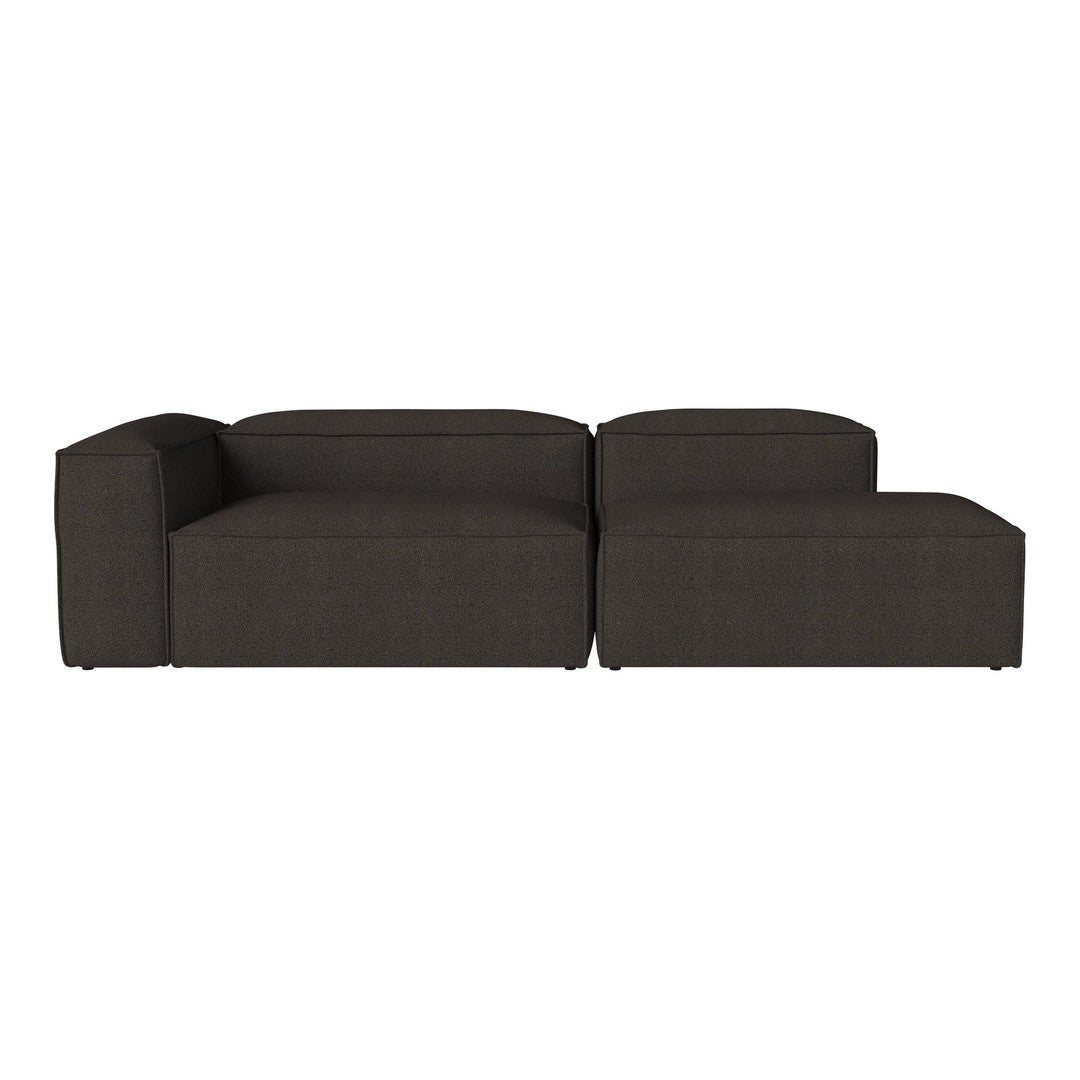 Dark gray sectional sofa with a sleek, minimalist design and solid fabric without patterns.