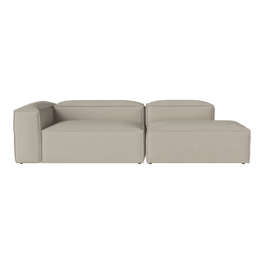 Light beige modular sofa with a sleek, minimalist design and soft upholstery, ideal for modern living spaces.