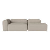 Light beige modular sofa with a sleek, minimalist design and soft upholstery, ideal for modern living spaces.