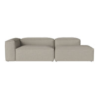 "Modern sectional sofa in light grey fabric with minimalist design and clean lines, perfect for contemporary decor."