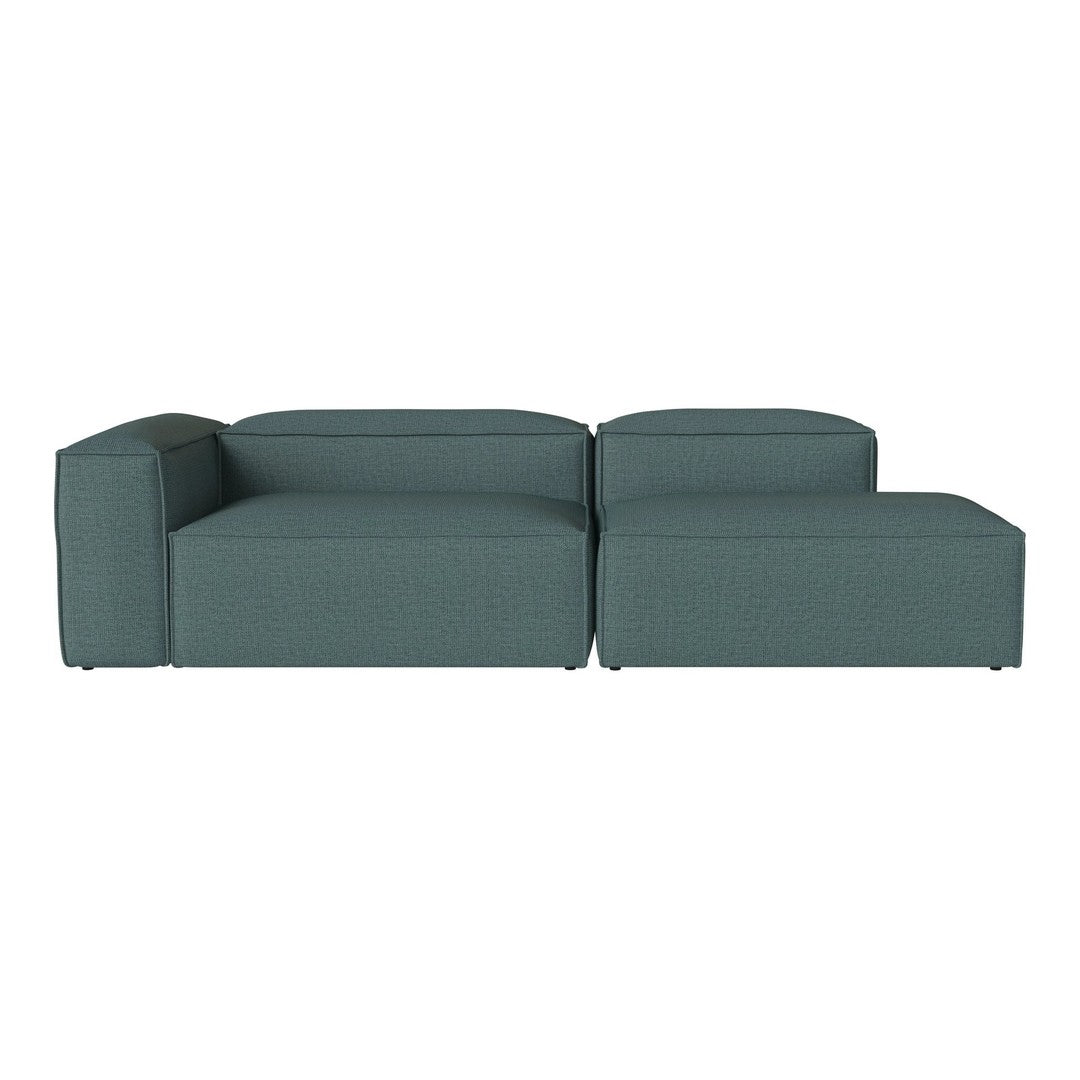 Teal sectional sofa with a minimalist design and smooth texture, featuring a solid color and contemporary style.