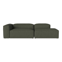 Dark green modular sofa with a clean, modern design and textured fabric upholstery. Ideal for contemporary living spaces.