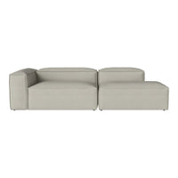 Light gray sectional sofa with a minimalist design and smooth, modern lines. Soft fabric texture complements any decor.