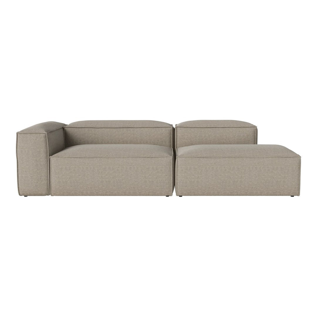 Beige modular sofa with a smooth, textured fabric and minimalist design. Ideal for modern interior decor.