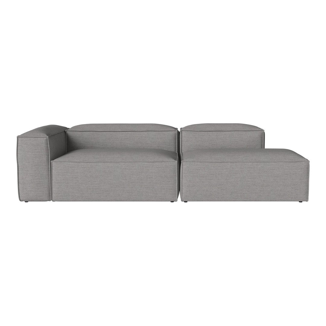 Modern gray sectional sofa with a sleek, minimalist design and smooth, uniform fabric texture.