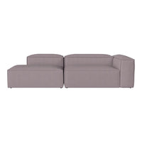 Contemporary light gray sectional sofa with sleek, solid pattern and clean lines, ideal for modern living spaces.
