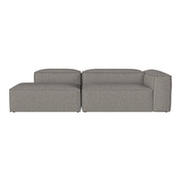 Modern gray sectional sofa with a sleek, minimalist design and subtle textured fabric patterns.