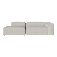 Light gray sectional sofa with a minimalist design and smooth texture. Perfect for modern living spaces.