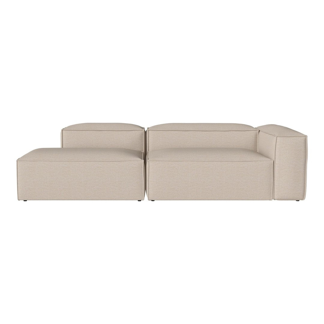 Beige modular sofa with a smooth, minimalist design and clean lines, perfect for modern living spaces.