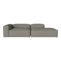 Modern sectional sofa in soft gray fabric with clean lines and no visible patterns. Ideal for contemporary interiors.
