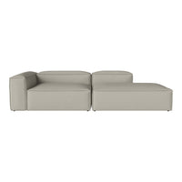 Light gray modular sectional sofa with a smooth, minimalist design and no visible patterns. Perfect for modern decor.