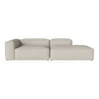 Modern beige sectional sofa with sleek lines and minimalist design, perfect for any contemporary living space.