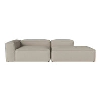 Beige modular sectional sofa with a smooth, textured fabric finish, featuring subtle contemporary design. Perfect for any living space.