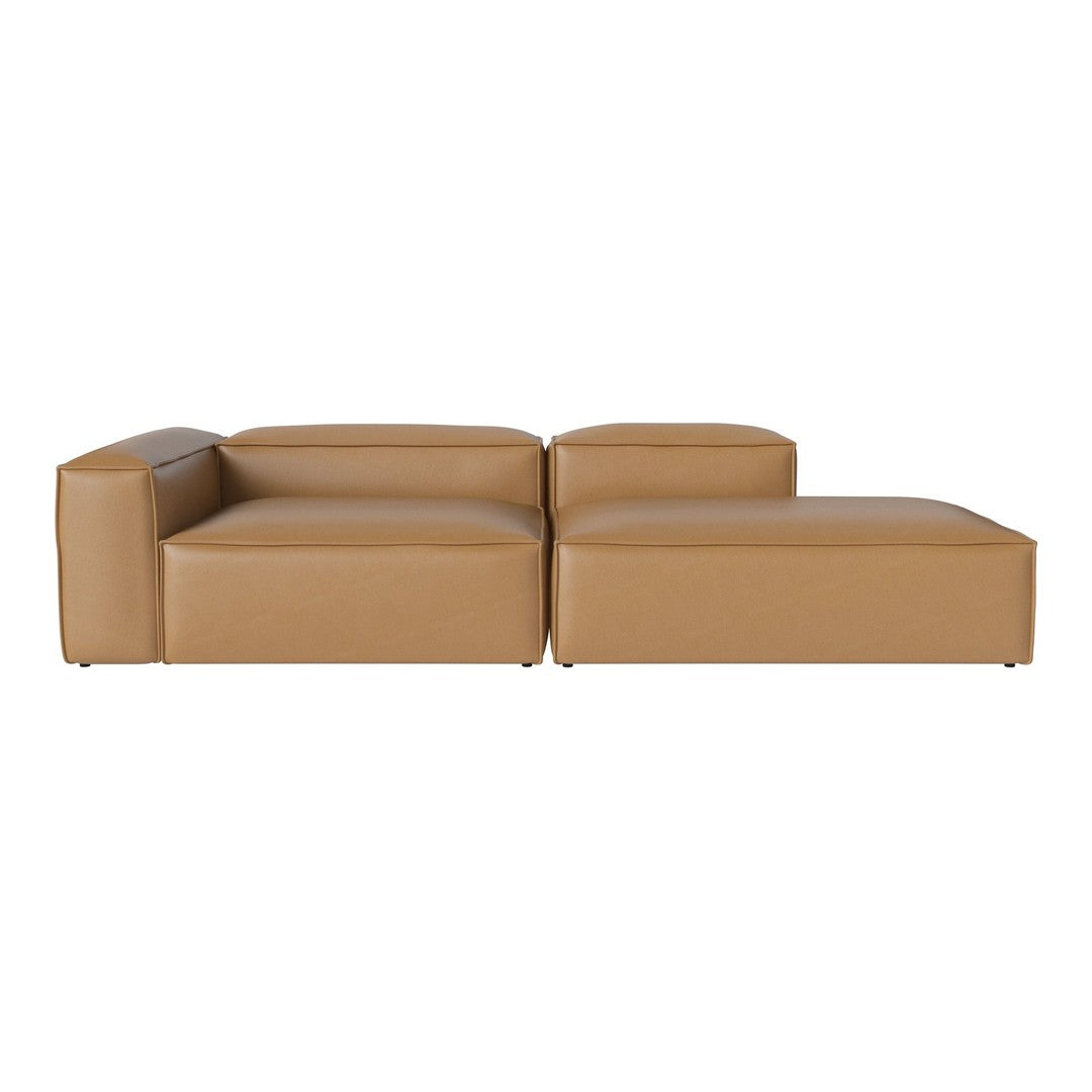 Stylish tan leather sectional sofa with a smooth, modern design and minimalist aesthetic. Perfect for contemporary decor.