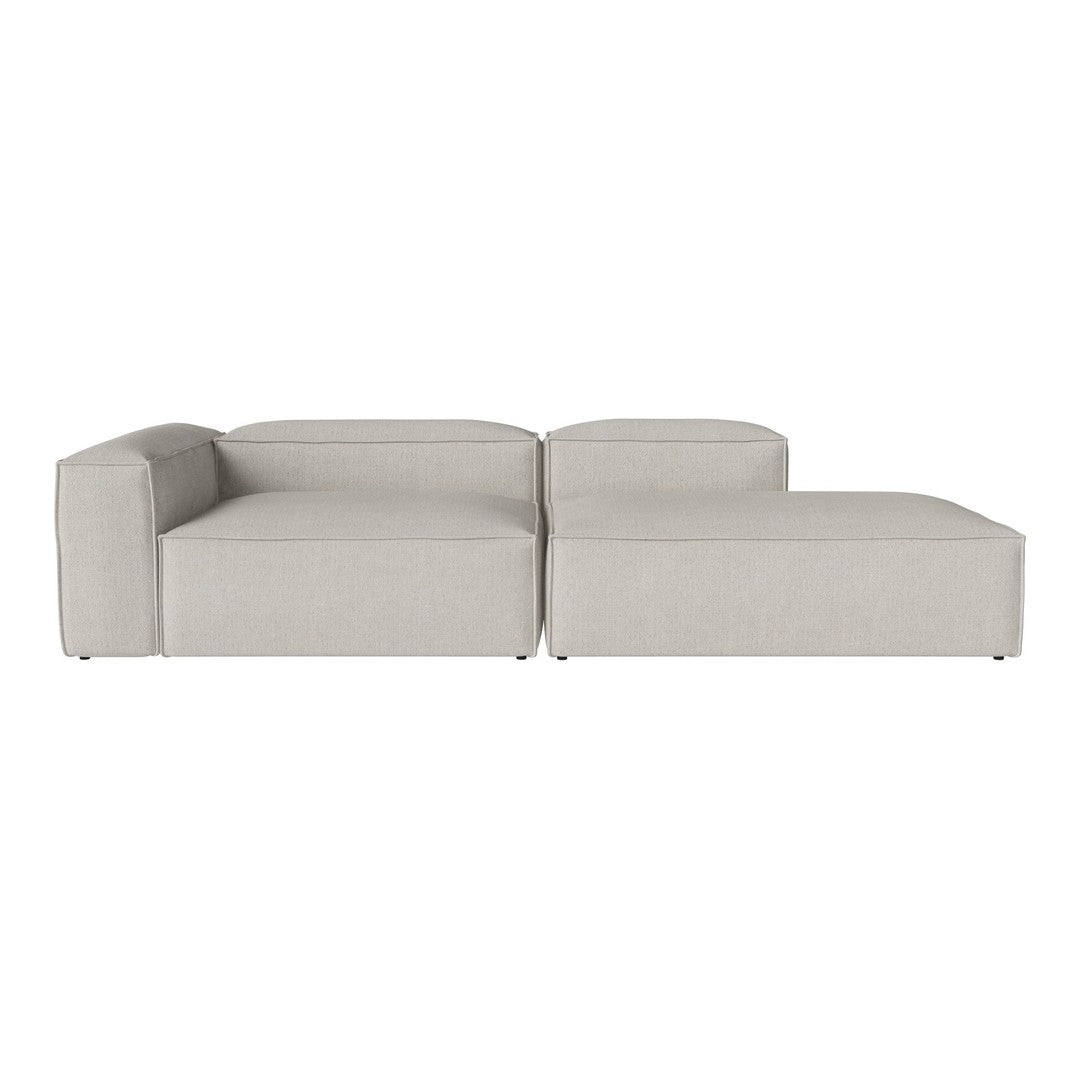 "Modern light gray modular sofa with smooth, minimalist design and subtle texture."