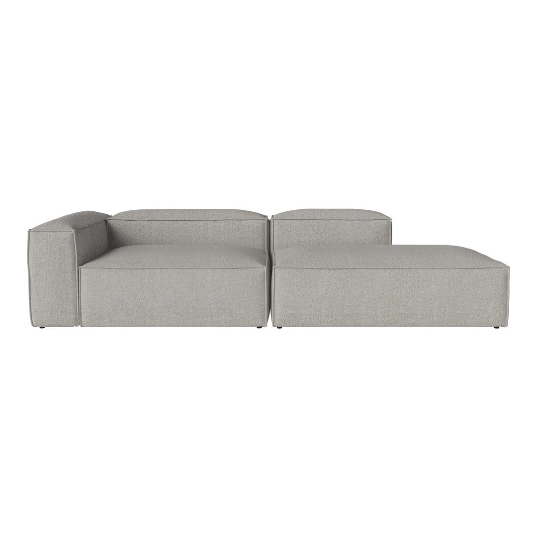 Gray modular sofa with a modern design featuring clean lines and a textured fabric. Ideal for contemporary decor.