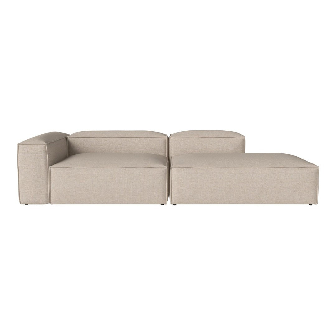 Beige modular couch with a sleek, modern design and clean lines, perfect for contemporary interiors.