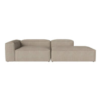 Beige modular sofa with a textured, minimalist design. Perfect for modern living spaces.