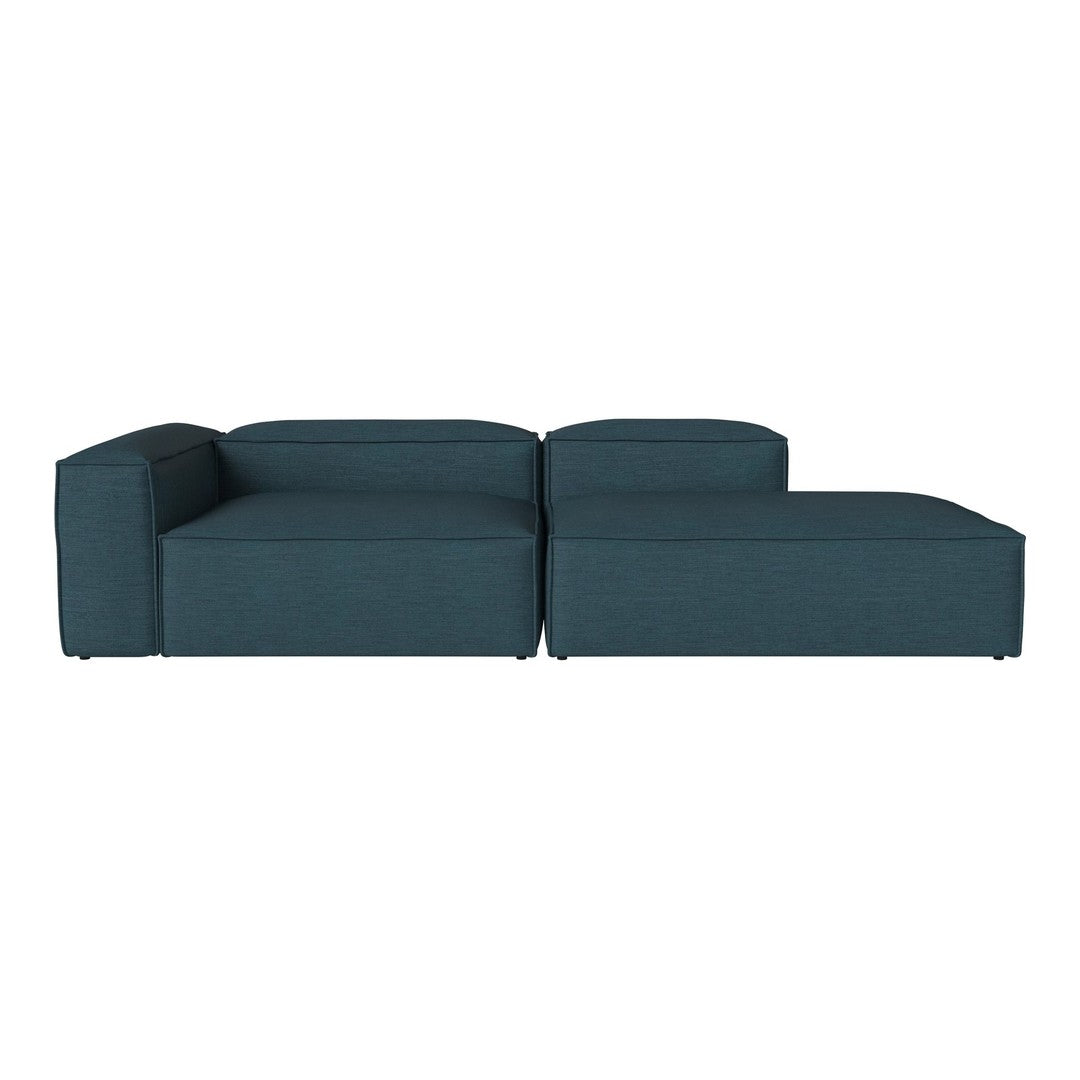 Teal upholstered sectional sofa with a minimalist design and smooth fabric texture.
