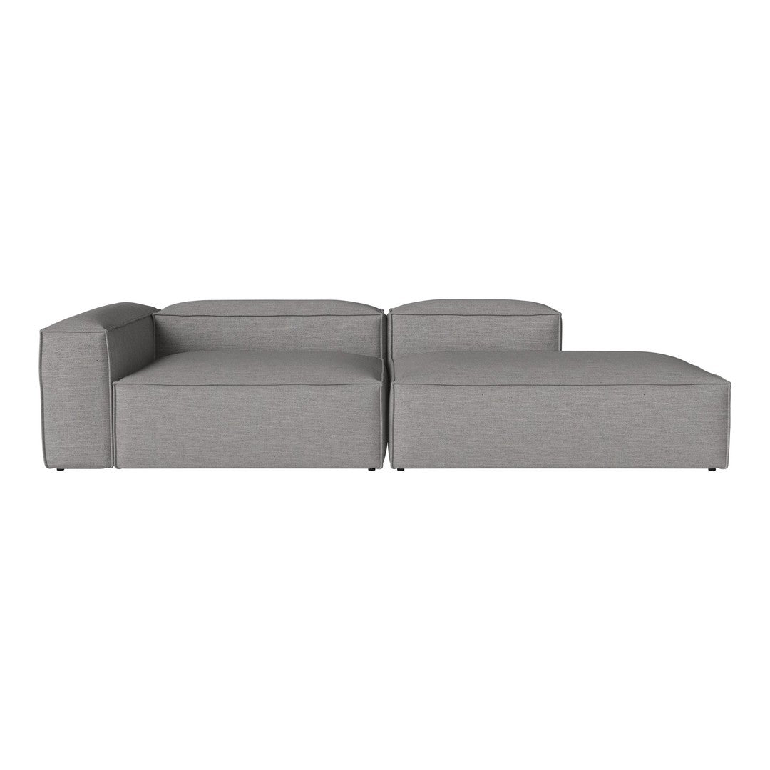 Gray modular sectional sofa with a smooth, minimalistic design and soft fabric upholstery. Perfect for modern interiors.