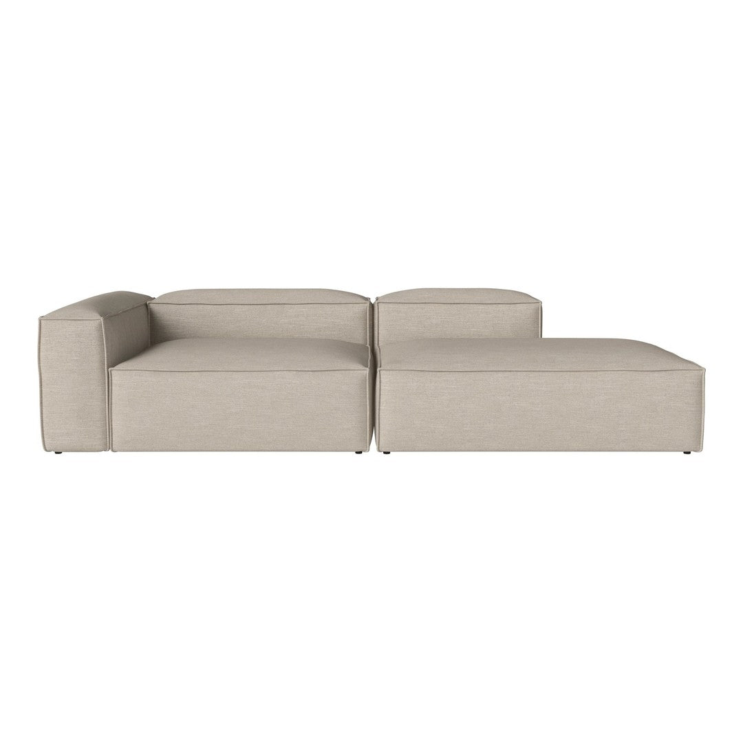 Modern beige sectional sofa with clean lines and textured fabric. Minimalist design perfect for contemporary interiors.