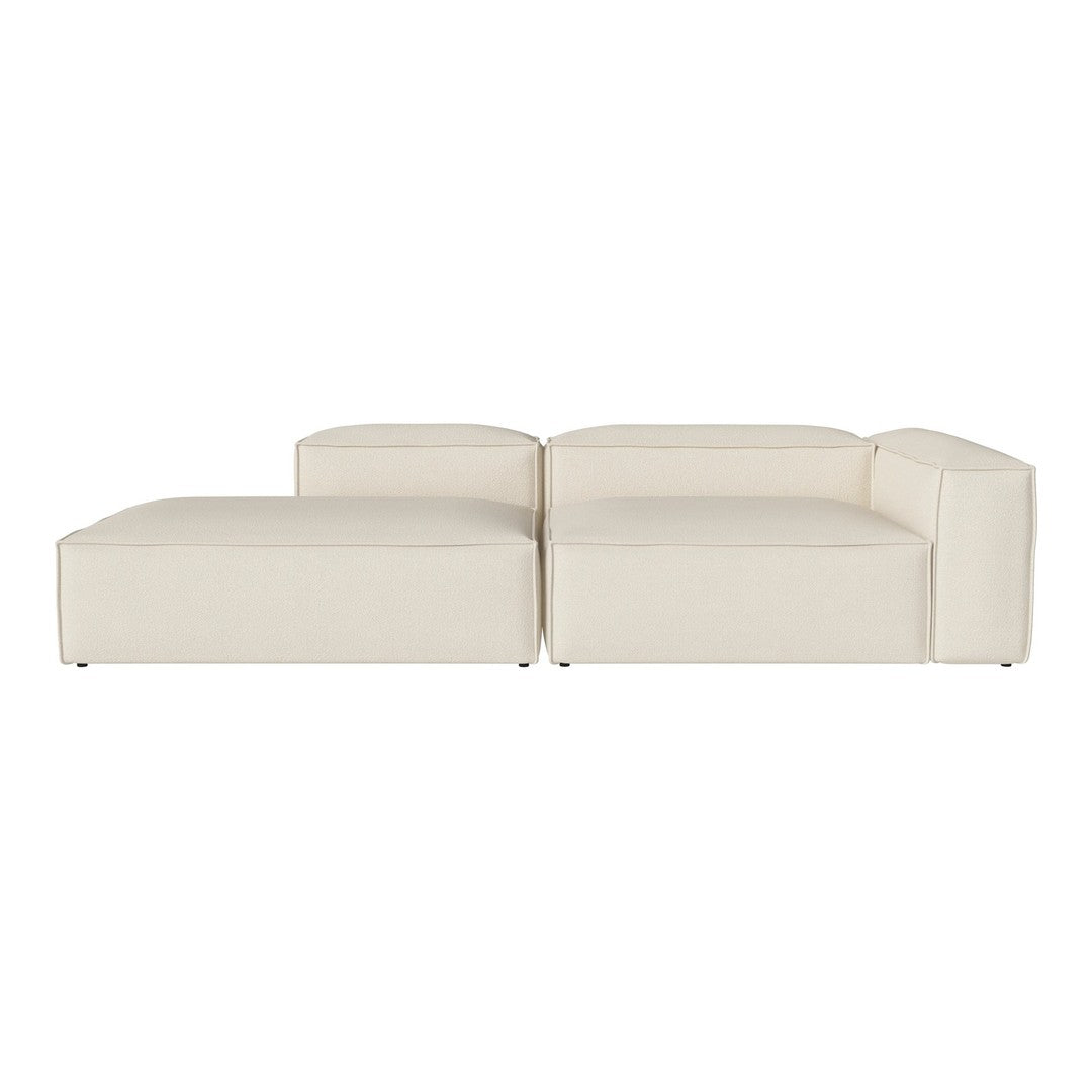 Beige modular sofa with a minimalist design and clean lines, featuring a smooth, uniform texture.