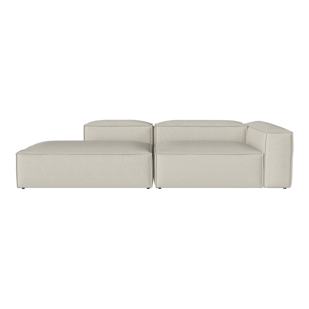 Beige sectional sofa with clean lines and minimalistic design, complementing modern home decor.