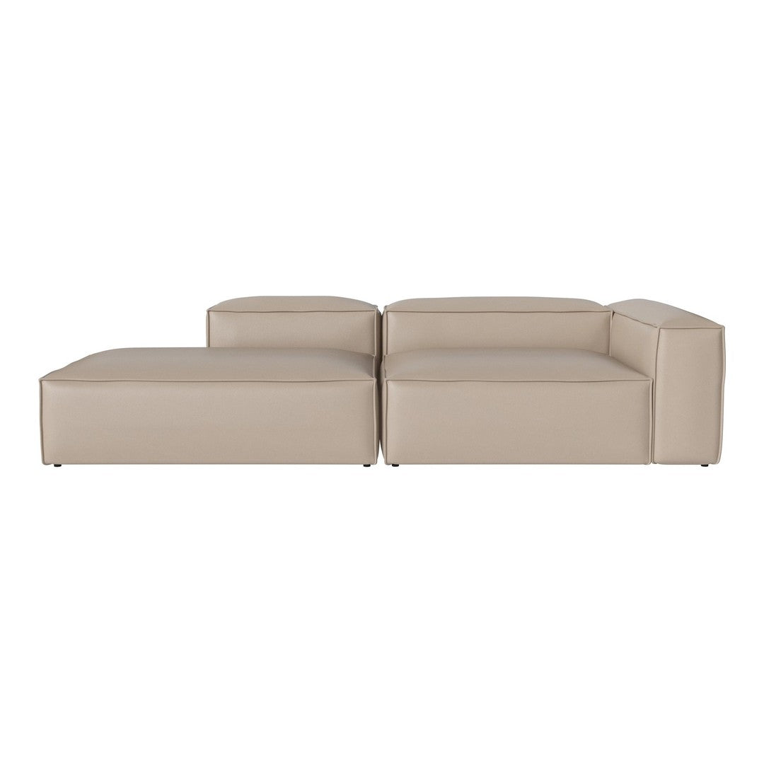Beige leather sectional sofa with a minimalist design and smooth, modern lines. Perfect for contemporary interiors.