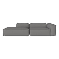 Gray sectional sofa with a modern, minimalist design and clean lines, perfect for contemporary spaces.