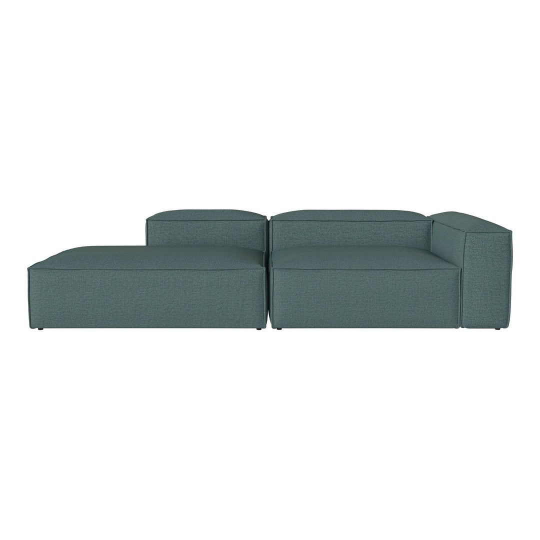 Teal modular sectional sofa with a sleek, modern design and smooth fabric texture, perfect for contemporary spaces.