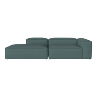 Teal modular sectional sofa with a sleek, modern design and smooth fabric texture, perfect for contemporary spaces.