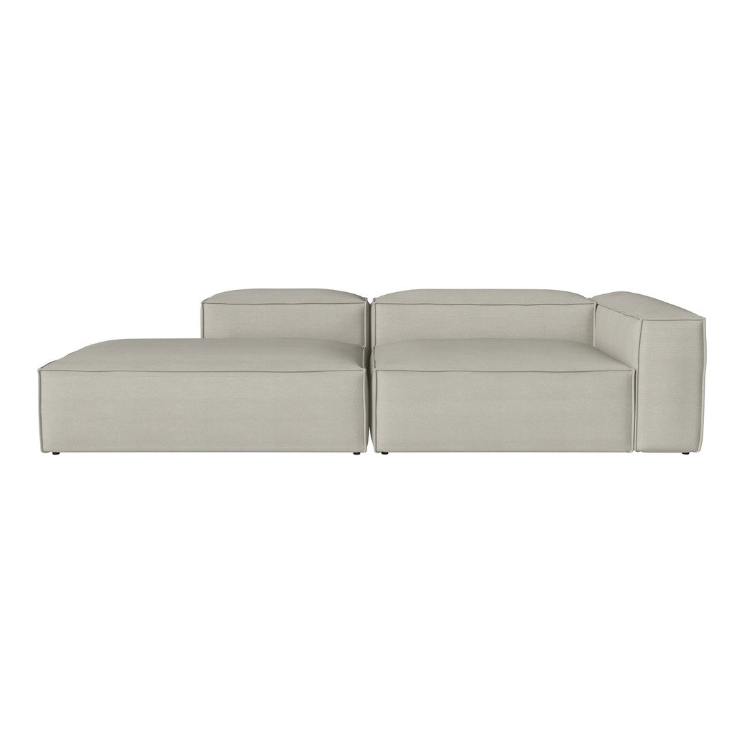 Light gray sectional sofa with a modern, minimalist design featuring clean lines and seamless upholstery.