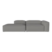 Modern grey sectional sofa with a sleek, minimalist design and smooth, solid fabric upholstery. Perfect for contemporary spaces.