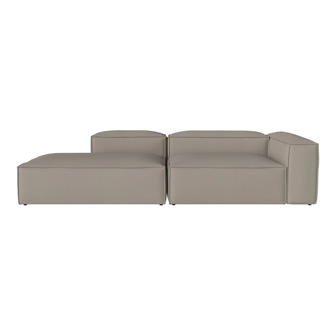 Light gray sectional sofa with smooth, modern lines and a minimalist design. Perfect for contemporary living spaces.