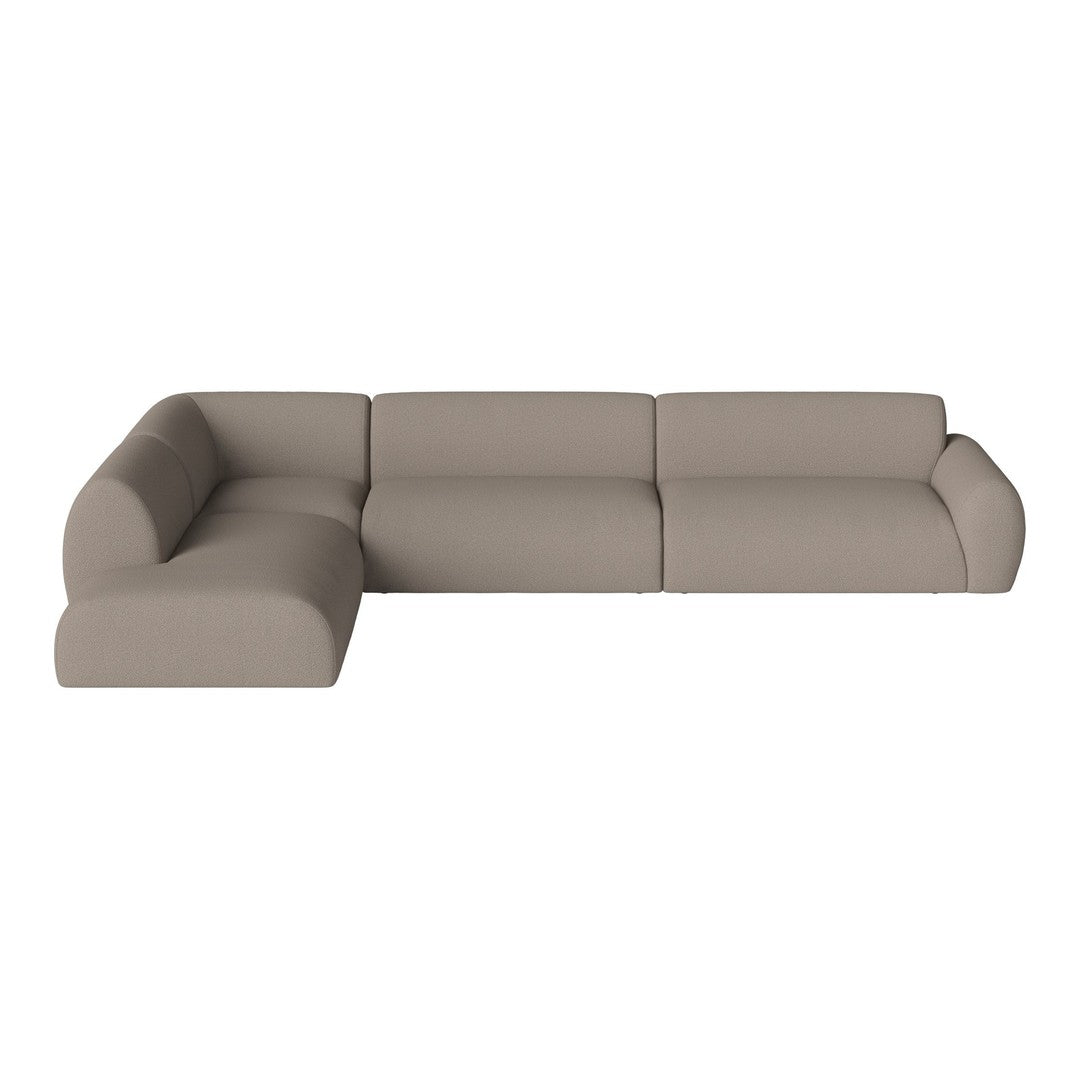 Neutral beige sectional sofa with a smooth, minimalist design and seamless upholstery, perfect for modern living spaces.
