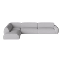 Modern light gray sectional sofa with smooth fabric and minimalist design. Perfect for contemporary living spaces.