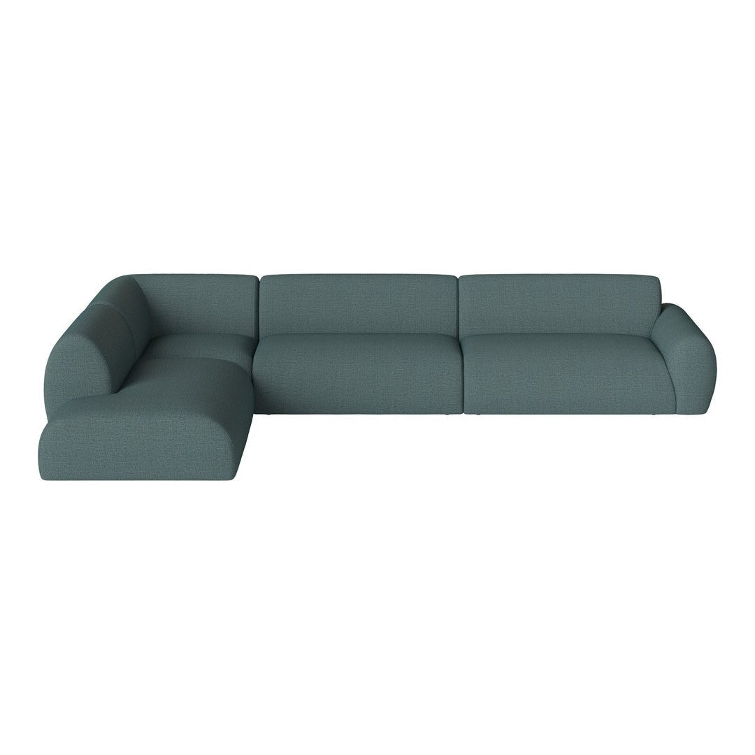 Modern teal sectional sofa with solid color upholstery and a sleek design, perfect for contemporary living spaces.