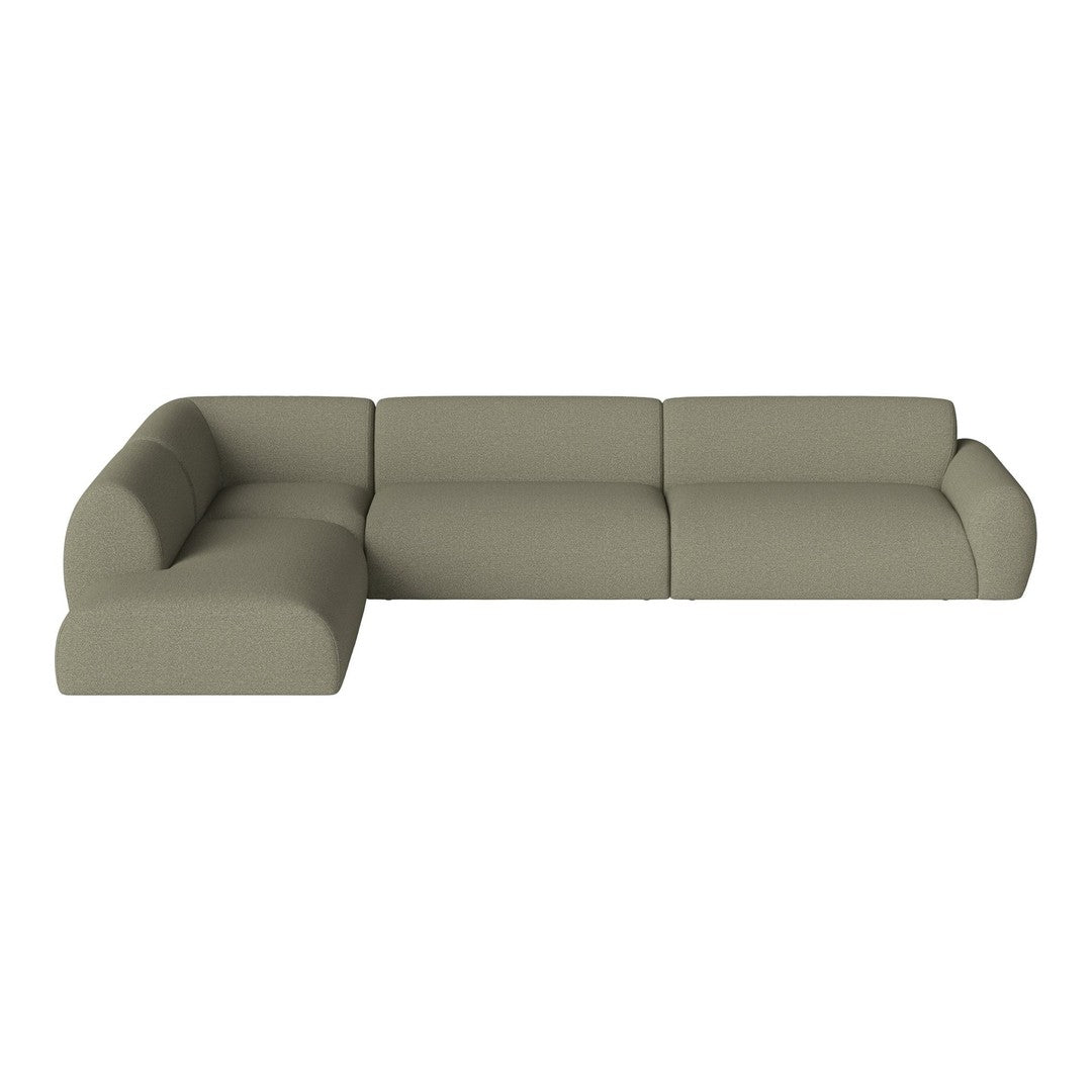 Modern sectional sofa in soft olive green fabric with a minimalist, contemporary design and smooth lines.
