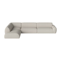 Light beige sectional sofa with smooth, minimalist design and no visible patterns. Perfect for modern interiors.