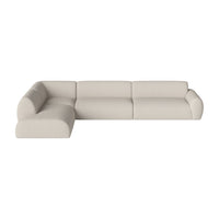 Beige sectional sofa with a smooth upholstery and modern, minimalist design. Ideal for contemporary living spaces.