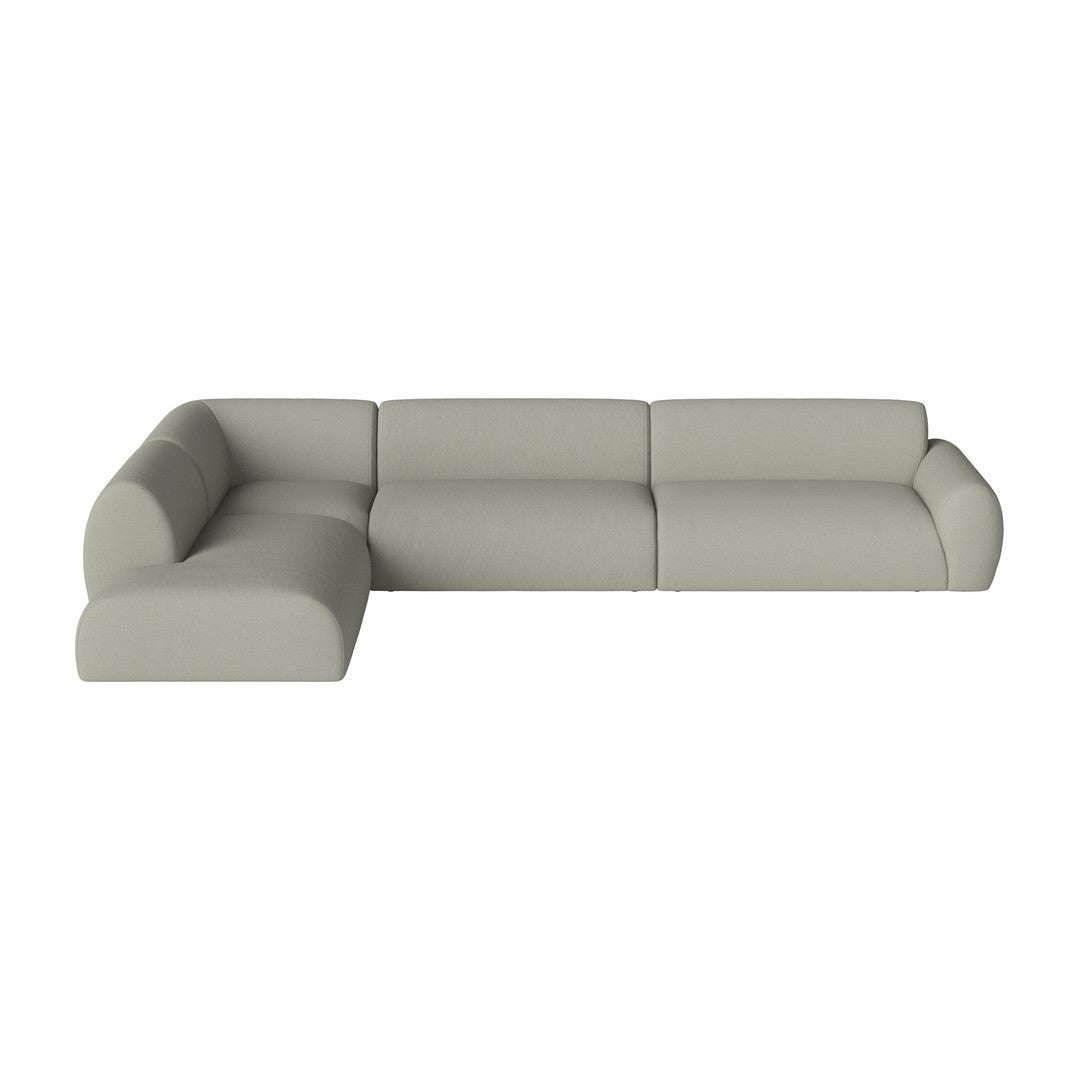 Light gray sectional sofa with a minimalist design and smooth, clean lines. Ideal for modern decor.