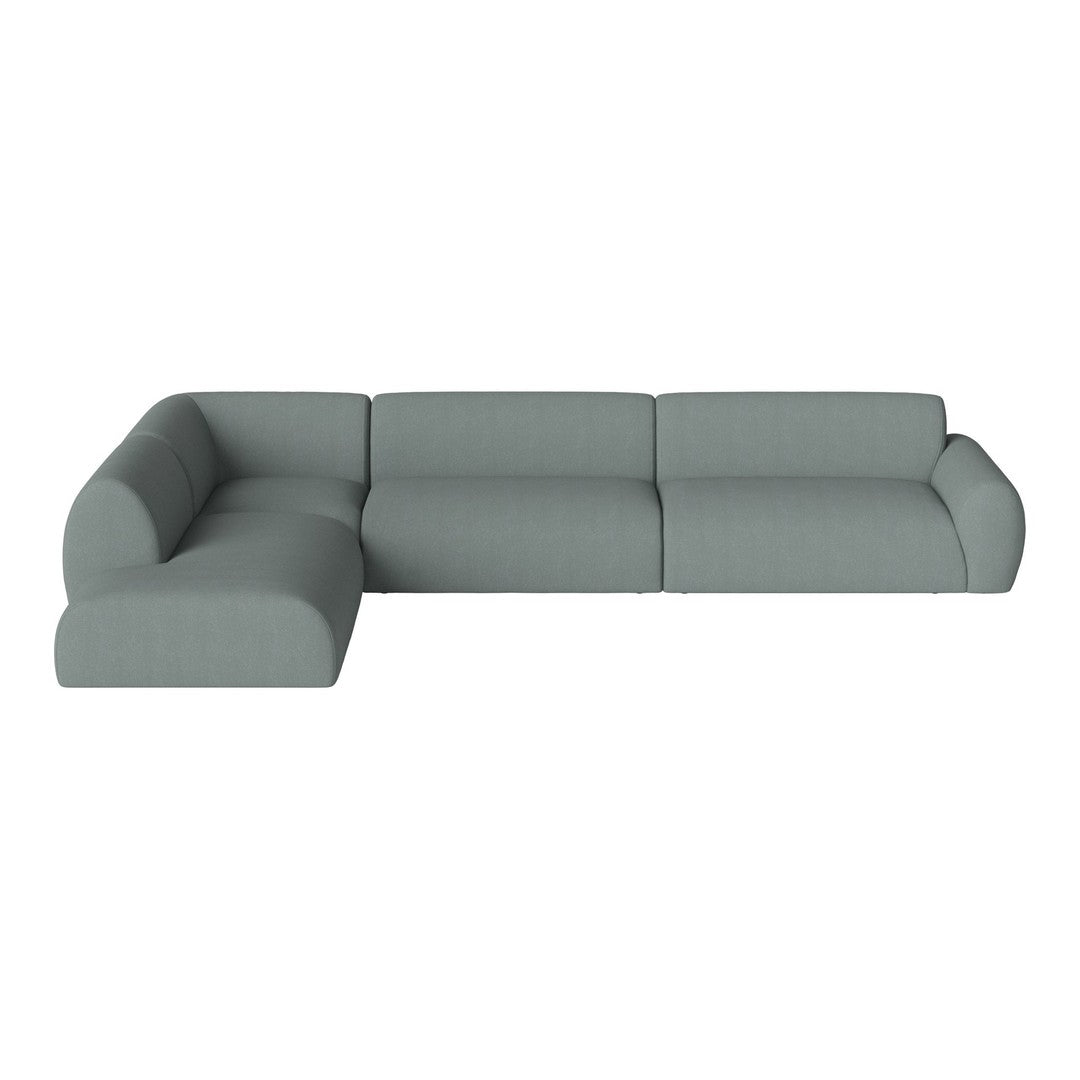 Light gray sectional sofa with a minimalist design and smooth, textured fabric. Ideal for modern living spaces.