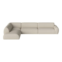 Beige sectional sofa with smooth, minimalist design and rounded cushions, perfect for modern interiors.