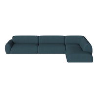 Teal sectional sofa with a sleek, modern design, featuring solid color and smooth fabric texture.