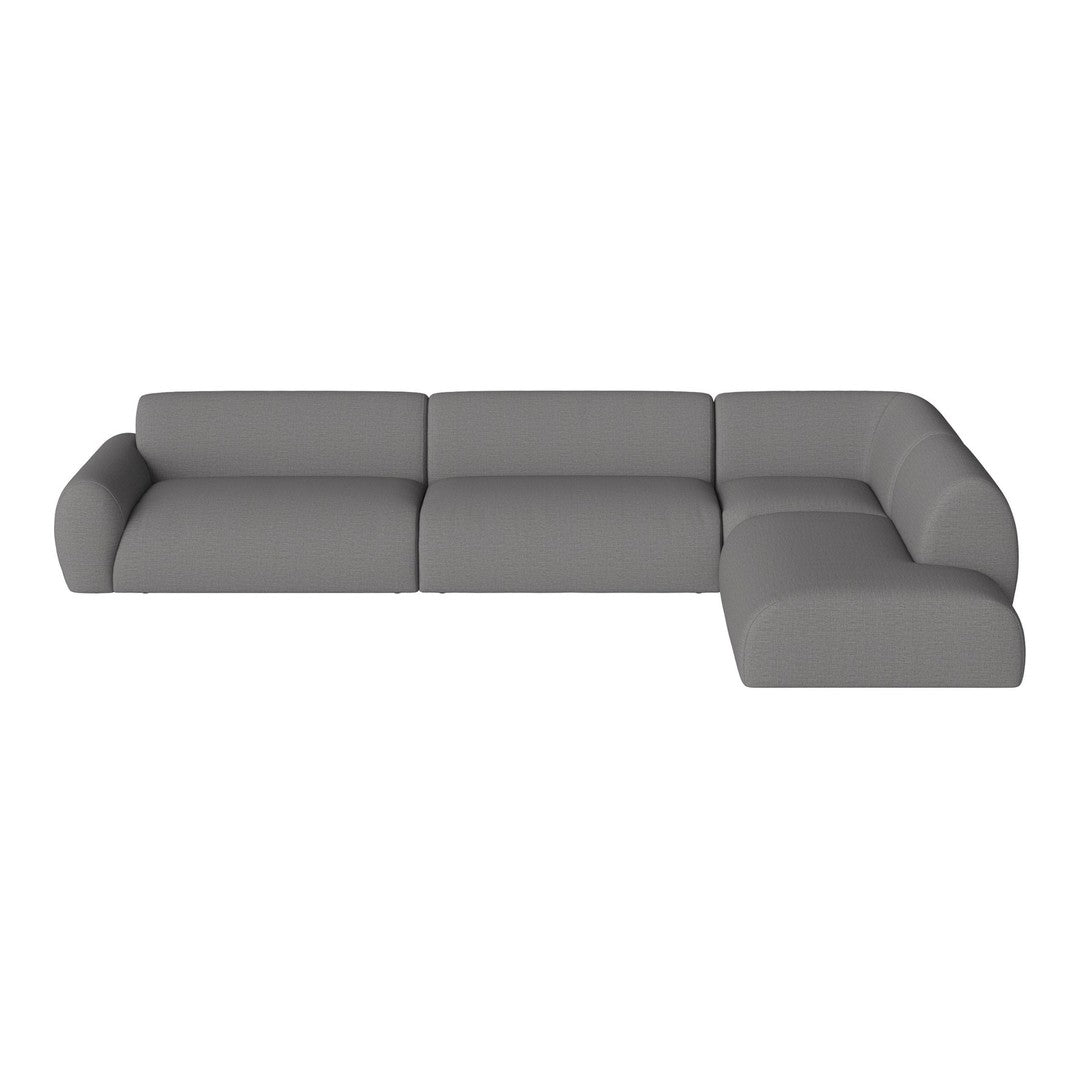 Modern L-shaped couch in soft grey upholstery with smooth, minimalistic design and no patterns. Perfect for any living room.