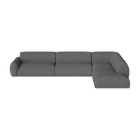 Modern gray sectional sofa featuring smooth, solid gray upholstery without patterns. Ideal for contemporary decor.